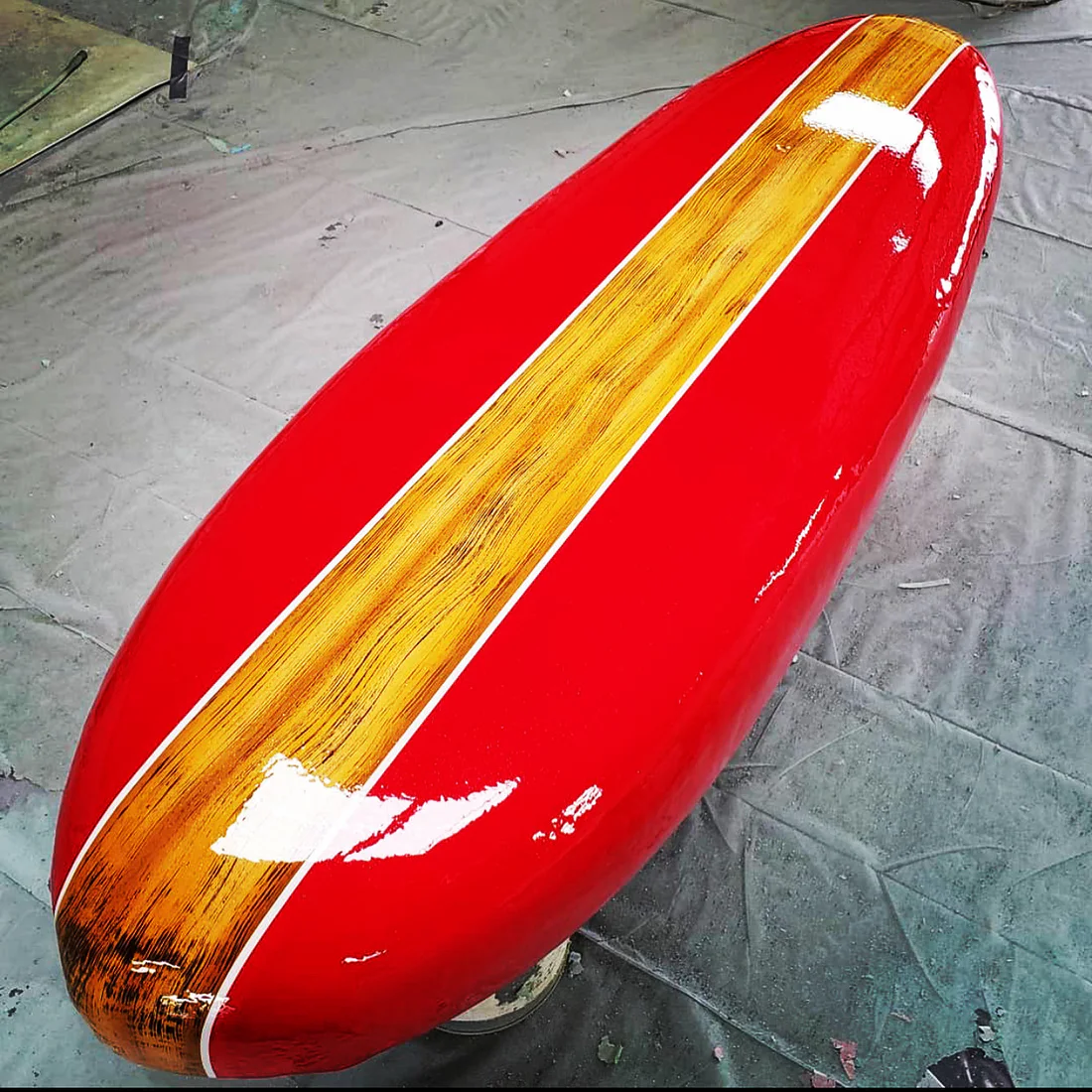 Red surfboard commercial aquatic floatable